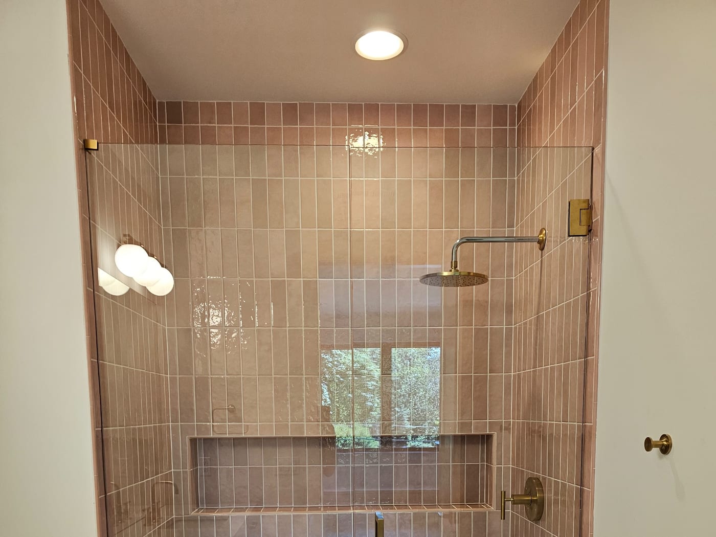 Glass enclosure, brass fixtures by Artemidas Renovation, Loganville
